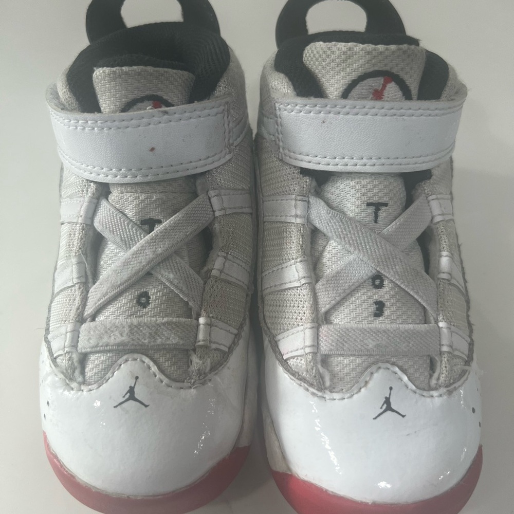 Kids Jordan’s - White and Red Sneakers